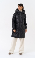Миниатюра фотографии Длинный пуховик из кожи