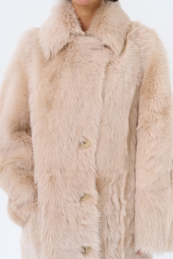 Миниатюра фотографии Женская двухсторонняя дубленка с поясом