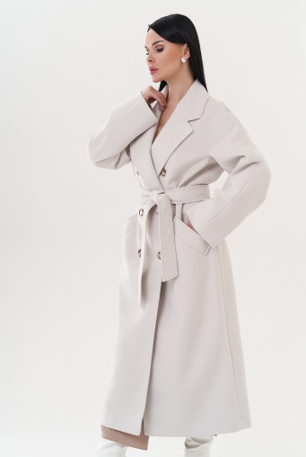 Миниатюра фотографии Женское длинное пальто с кремовом цвете