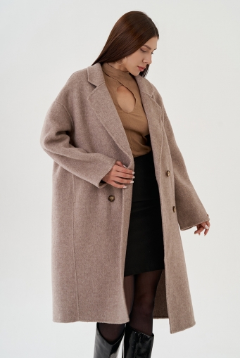Миниатюра фотографии Удлиненное женское пальто 